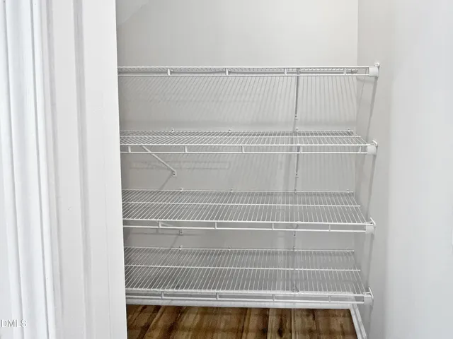 a kitchen with a stove and a microwave