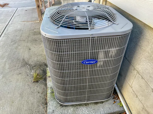 a kitchen with stainless steel appliances granite countertop a sink a stove top oven a counter space and cabinets