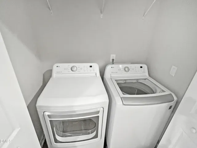 a view of staircase with white walls