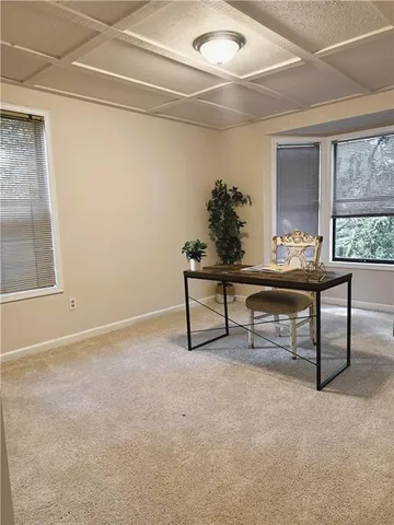 a room with furniture and window