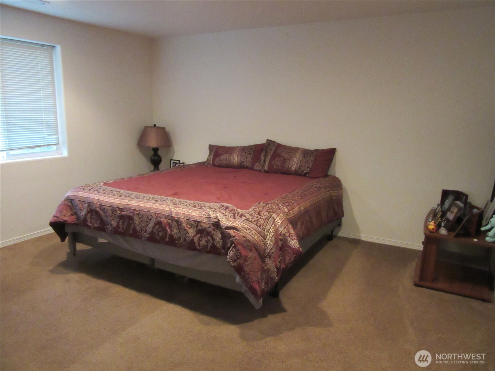 1011 South 3rd Street Dayton, WA 99328 - Photo 5 of 10 a bedroom with a bed and dresser