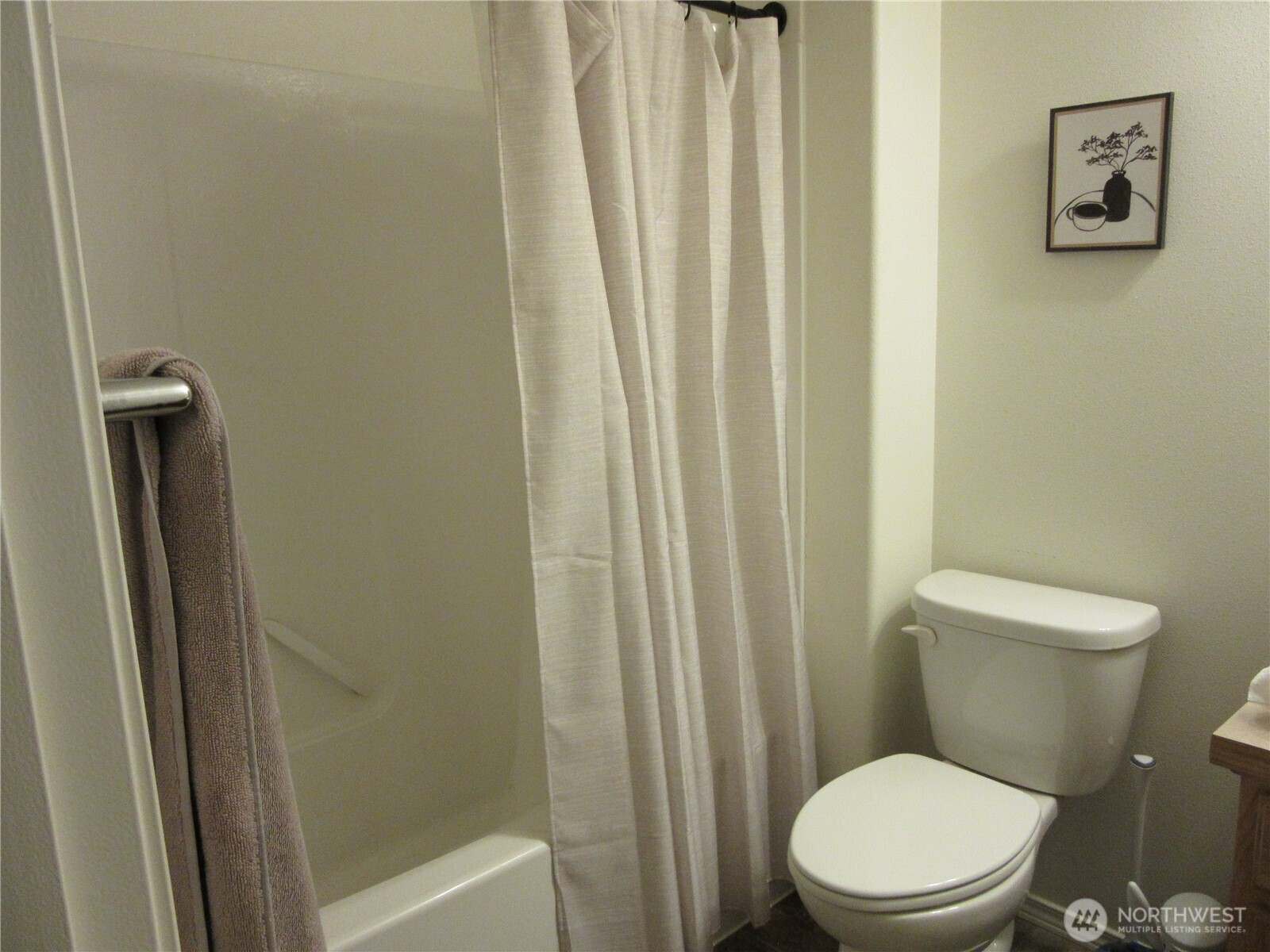 1011 South 3rd Street Dayton, WA 99328 - Photo 8 of 10 a white toilet sitting next to a shower