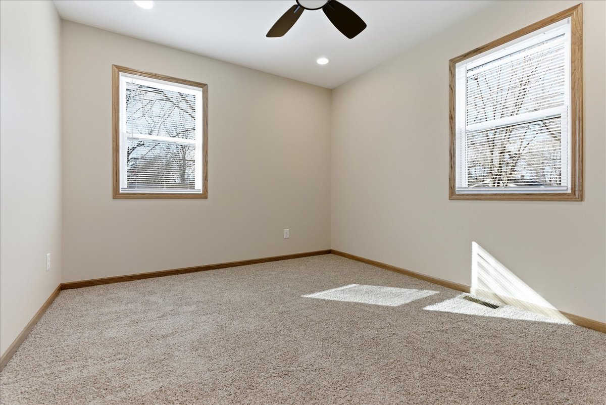 313 East Martin Street Forrest, IL 61741 - Photo 15 of 50 a view of an empty room with window and closet