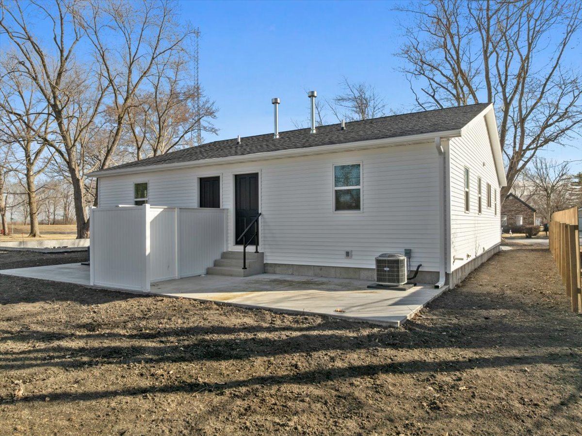 313 East Martin Street Forrest, IL 61741 - Photo 23 of 50 a view of a house with a yard