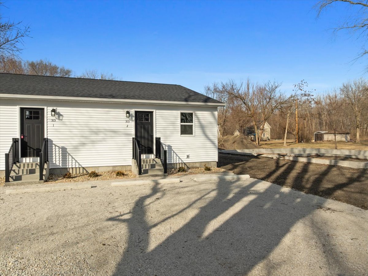 313 East Martin Street Forrest, IL 61741 - Photo 26 of 50 a view of a parking space in front of a house