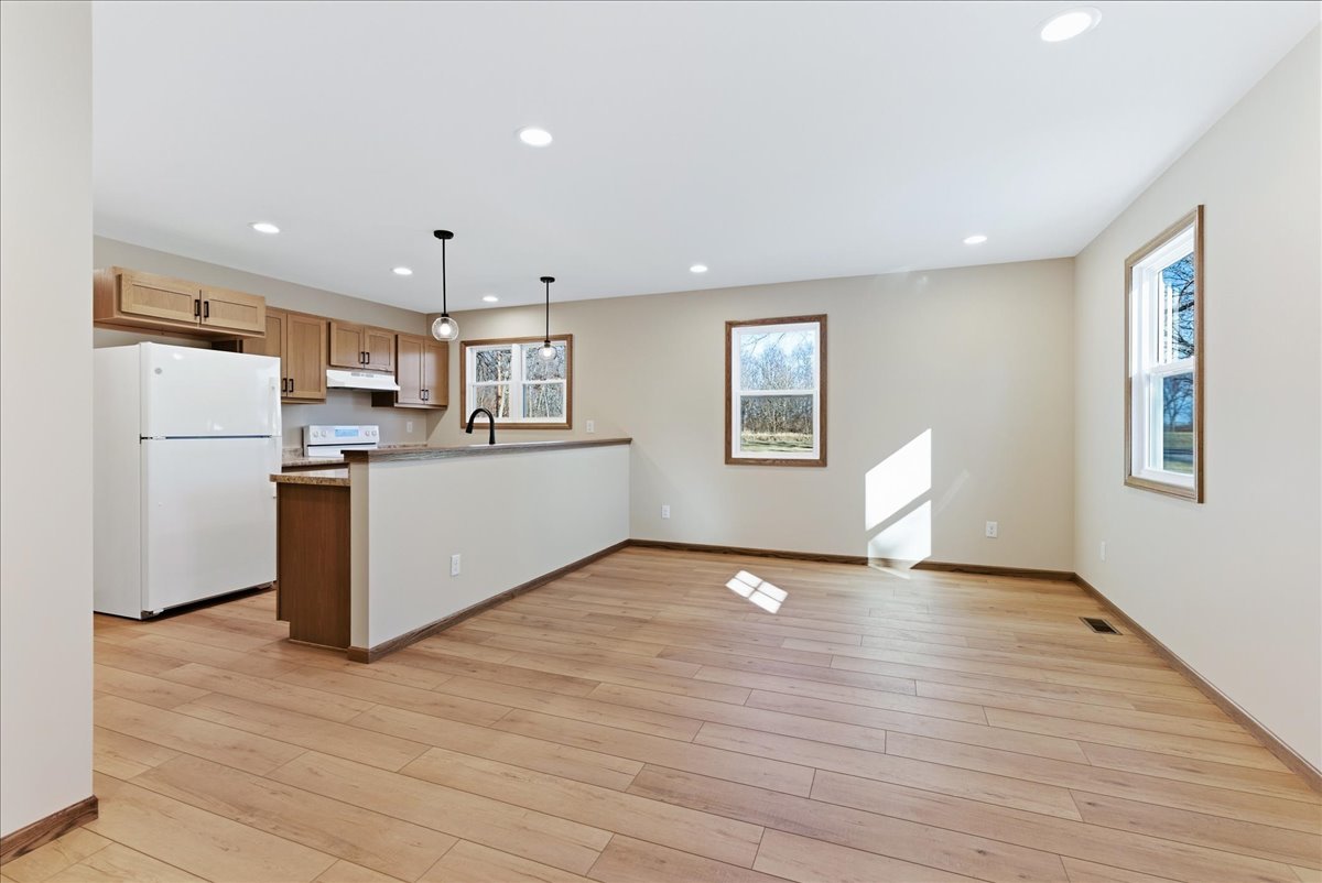 313 East Martin Street Forrest, IL 61741 - Photo 31 of 50 a view of kitchen with wooden floor and electronic appliances