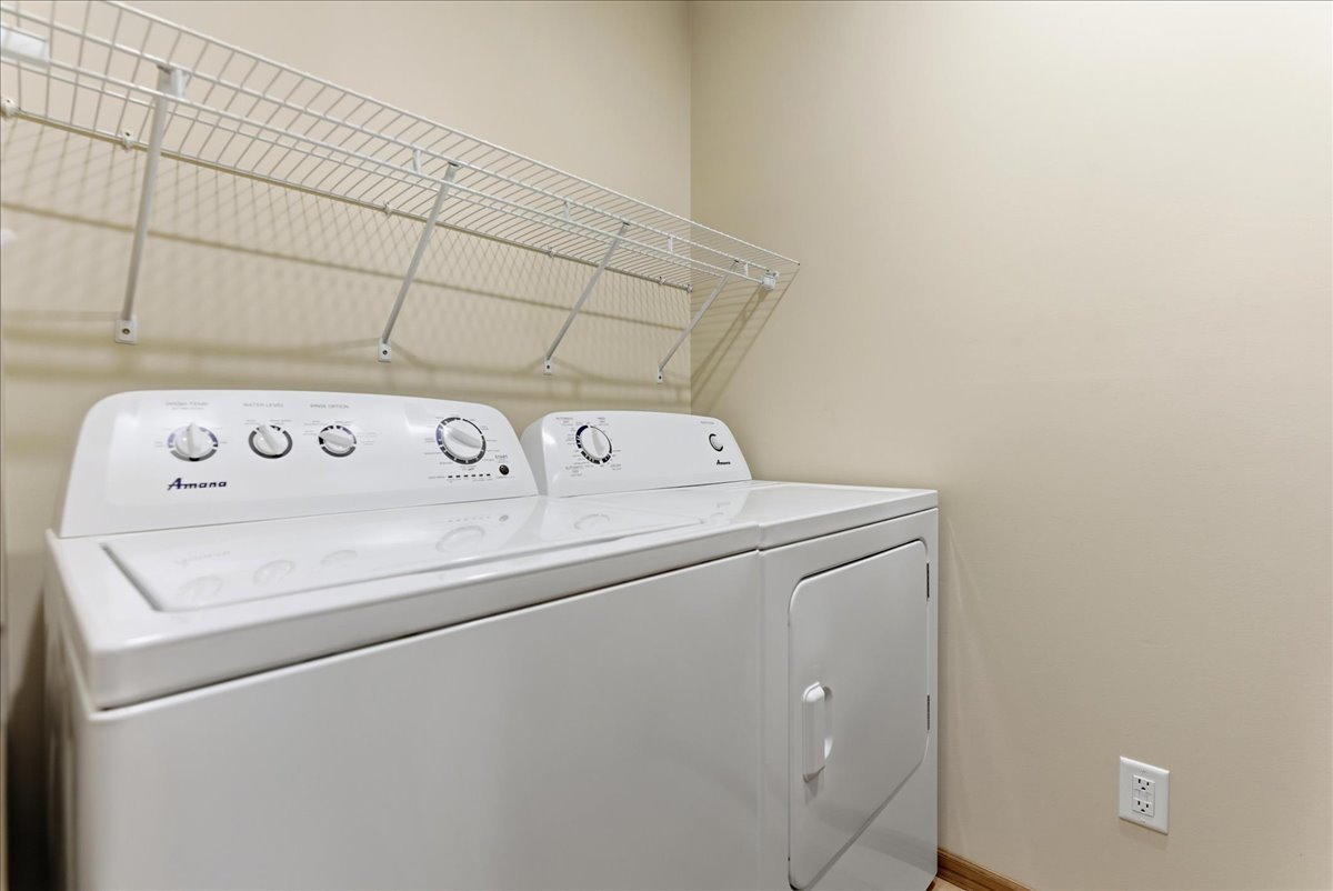 313 East Martin Street Forrest, IL 61741 - Photo 41 of 50 a utility room with dryer and washer