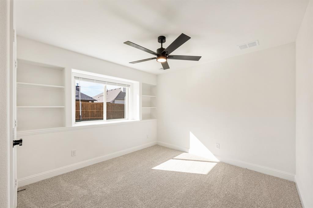 2009 Ambergate Drive Anna, TX 75409 - Photo 23 of 36 a view of an empty room with a window