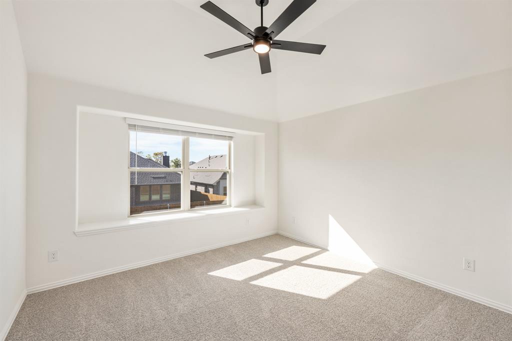 2009 Ambergate Drive Anna, TX 75409 - Photo 30 of 36 an empty room with a window and a fan