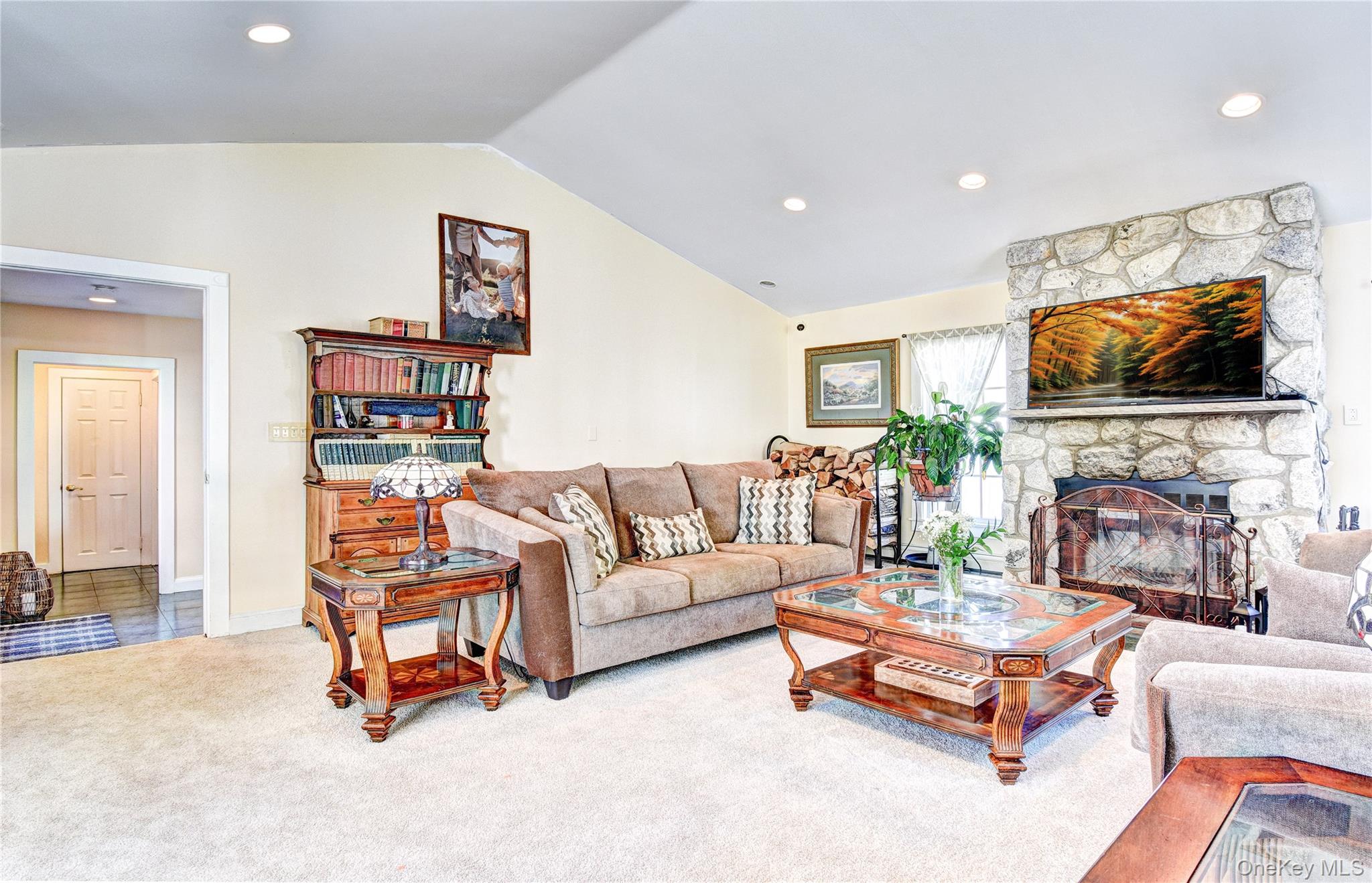 99 South Main Street Florida, NY 10921 - Photo 23 of 43 a living room with fireplace furniture and a flat screen tv
