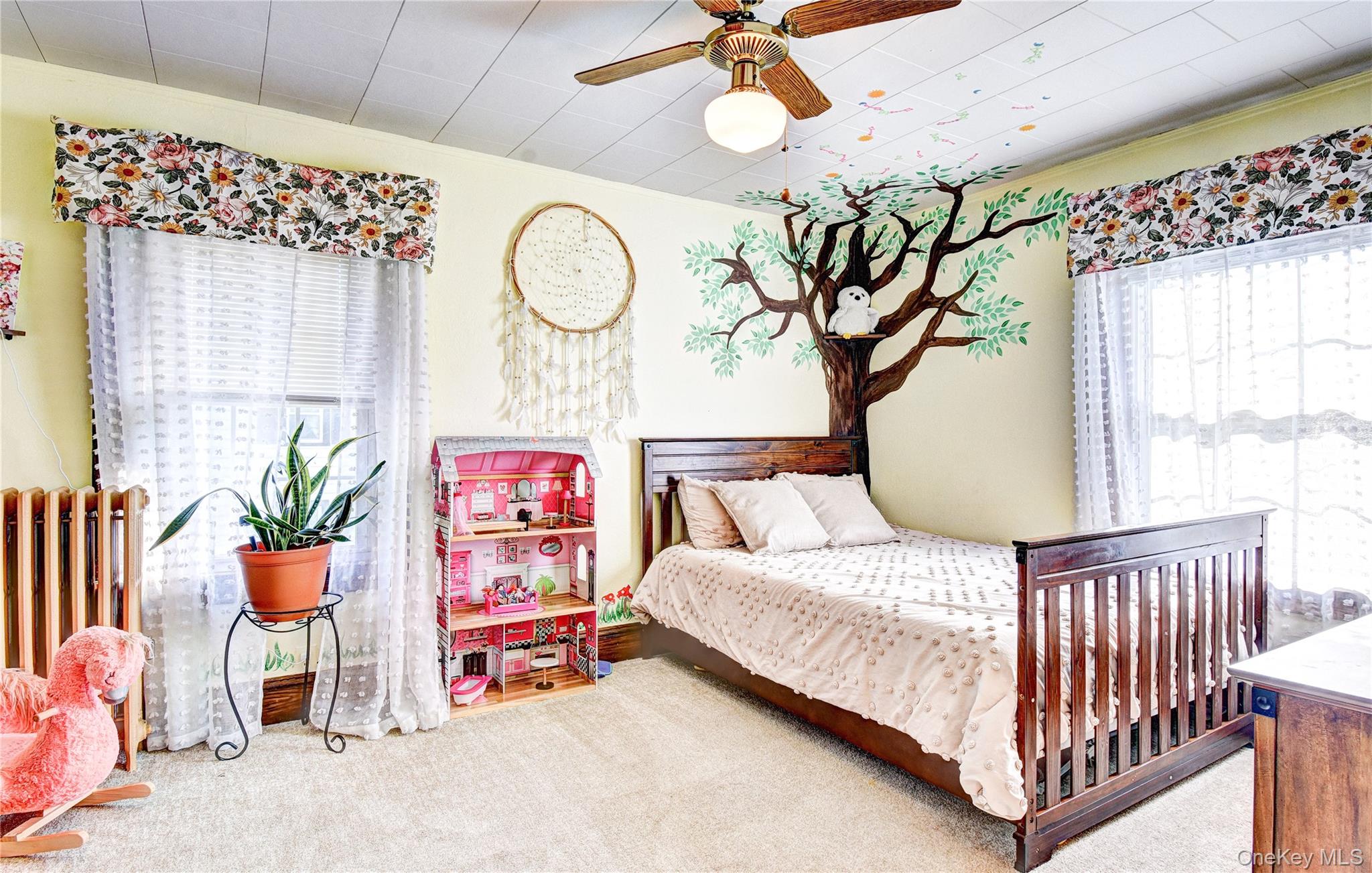 99 South Main Street Florida, NY 10921 - Photo 25 of 43 a bedroom with a bed and window