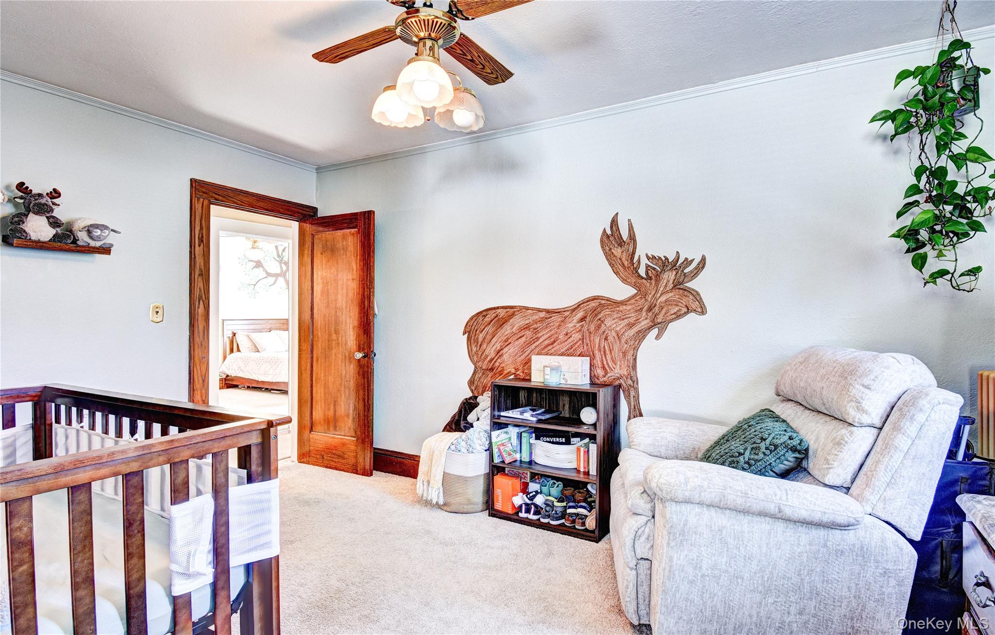 99 South Main Street Florida, NY 10921 - Photo 28 of 43 a bedroom with furniture and a potted plant