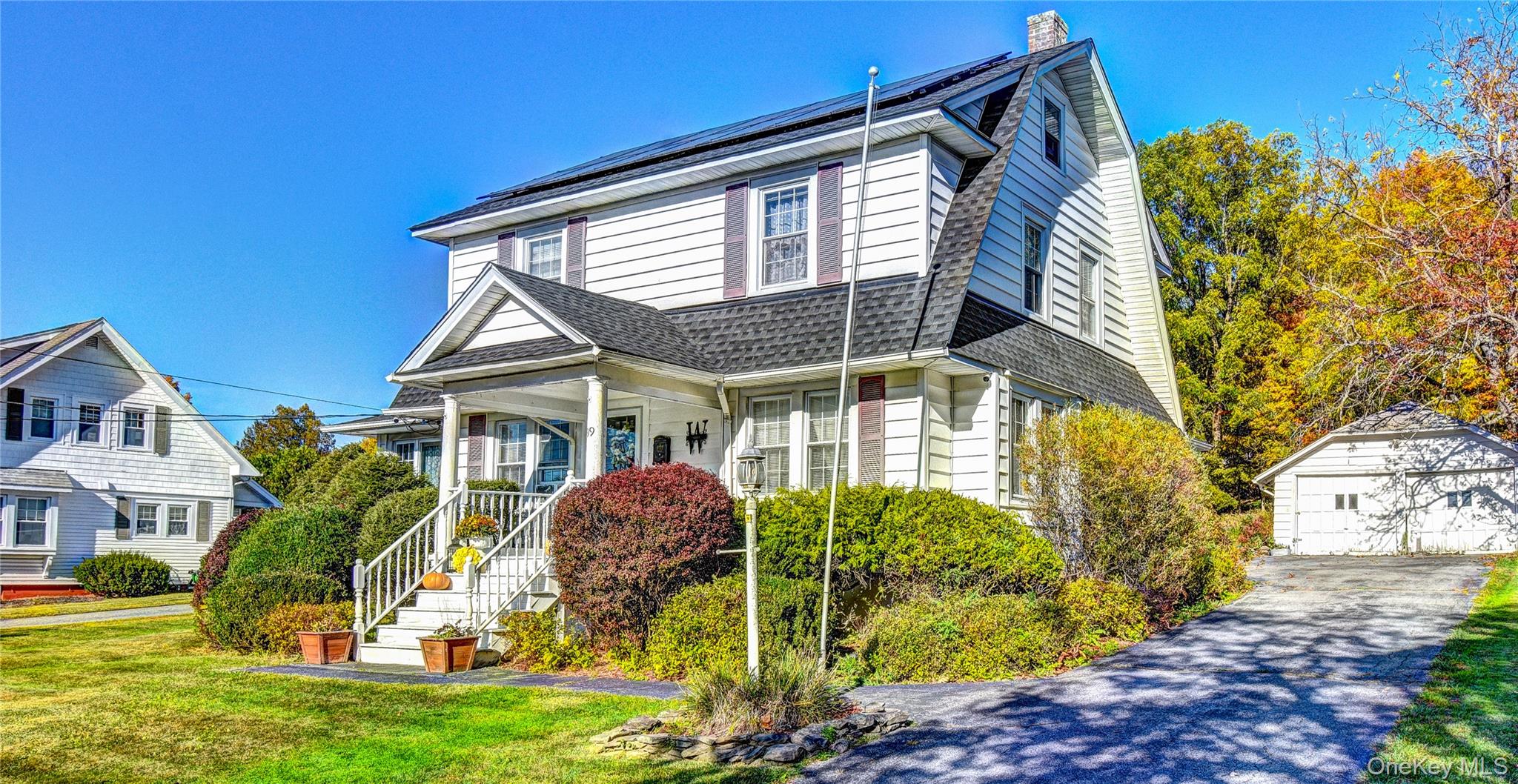99 South Main Street Florida, NY 10921 - Photo 4 of 43 a front view of a house with garden