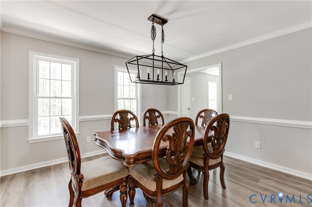 6320 Walnut Tree Drive Powhatan, VA 23139 - Photo 14 of 34 Dining area featuring light wood finished floors a