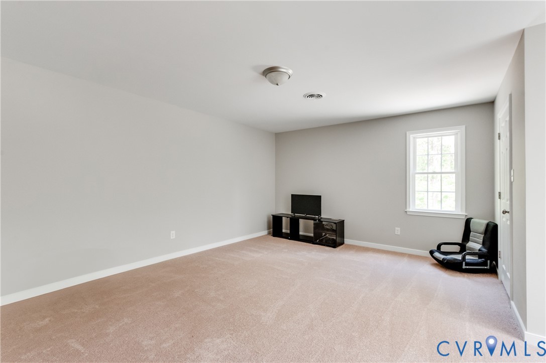 6320 Walnut Tree Drive Powhatan, VA 23139 - Photo 26 of 34 Unfurnished room featuring light colored carpet an