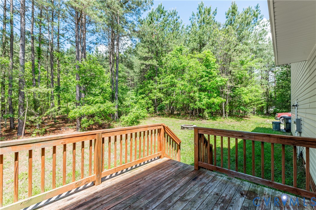 6320 Walnut Tree Drive Powhatan, VA 23139 - Photo 27 of 34 Wooden deck featuring a yard