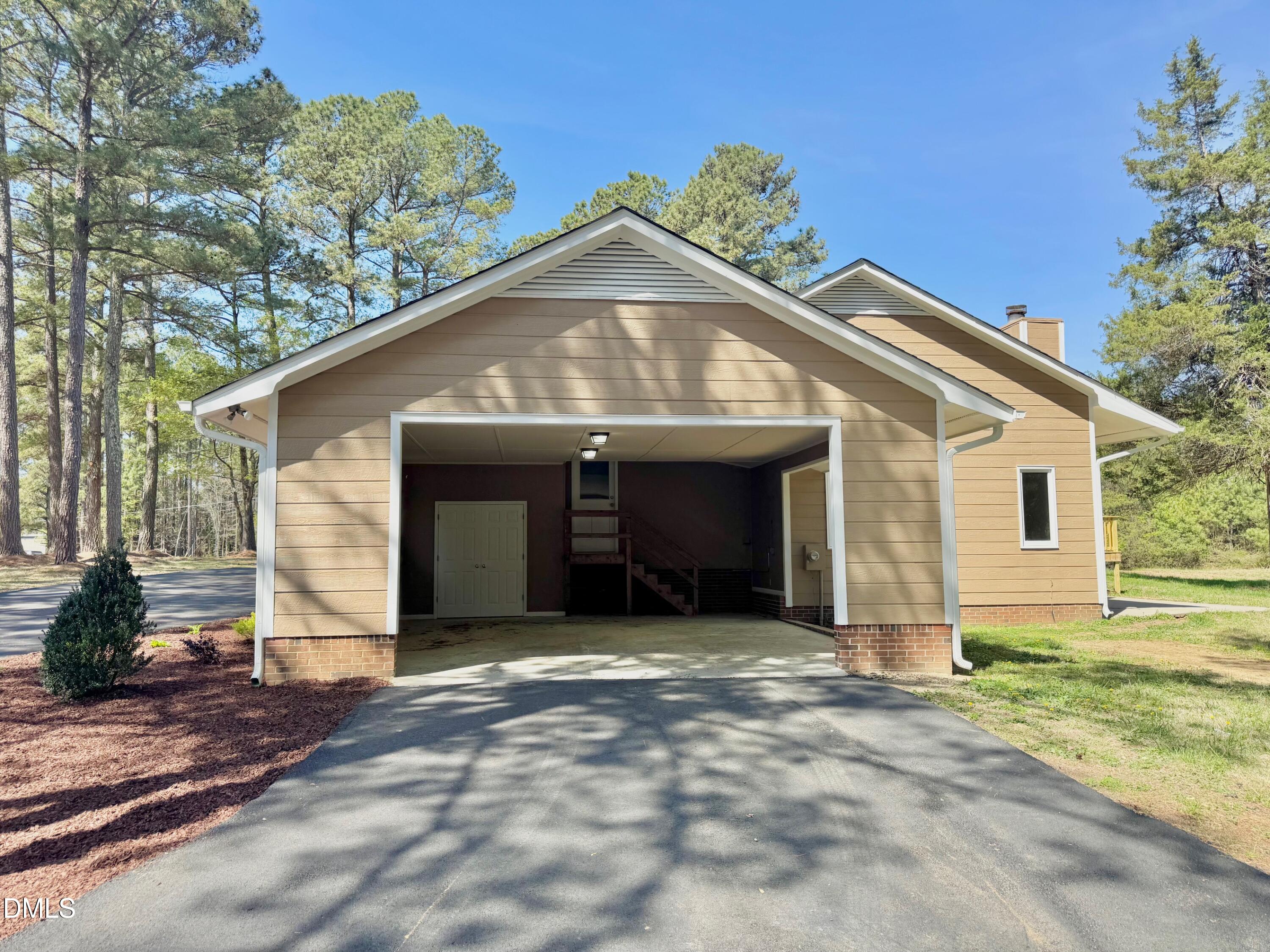 1720 Ross Mill Road Henderson, NC 27537 - Photo 3 of 42 a view of a house with a yard