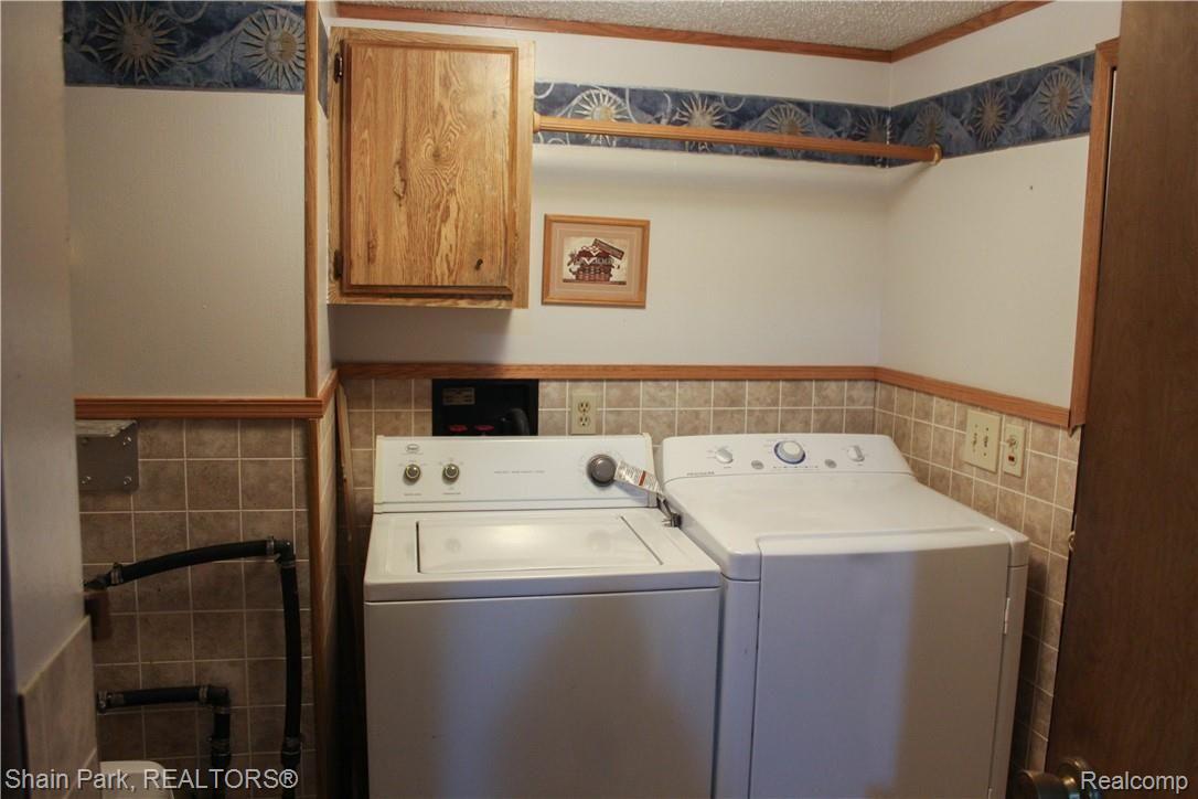 14676 Bryce Road Capac, MI 48014 - Photo 13 of 30 Laundry Room with Access to Deck and Backyard