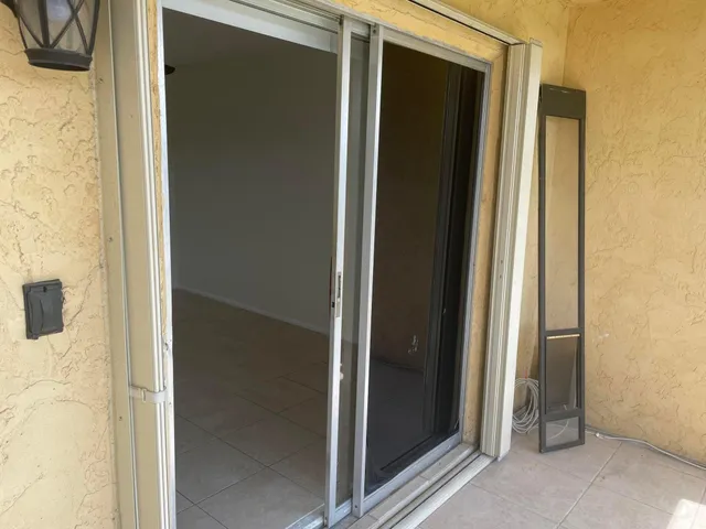 a view of a bathroom from a hallway
