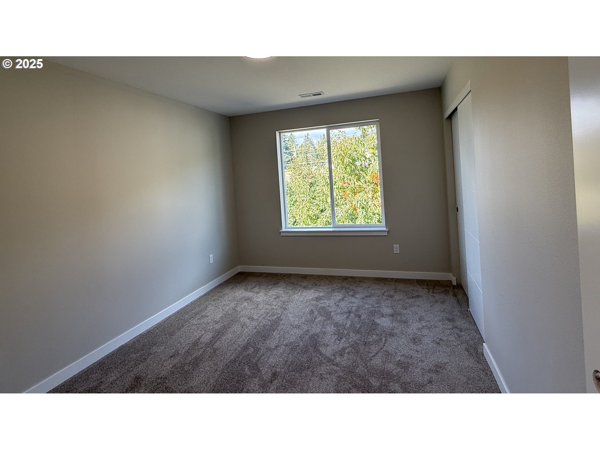 14362 Southeast Knight Street Portland, OR 97236 - Photo 11 of 15 a open hall with a window