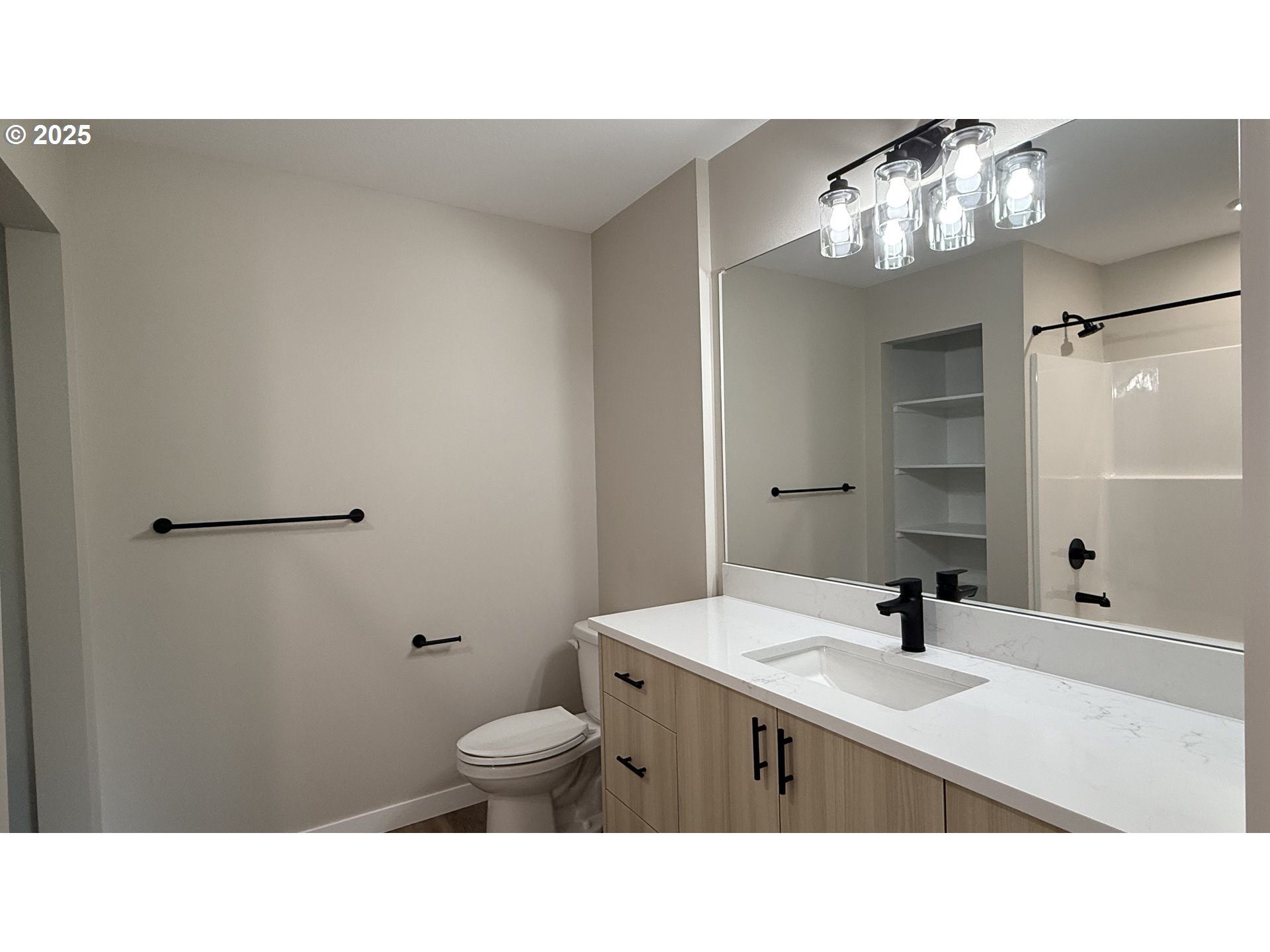 14362 Southeast Knight Street Portland, OR 97236 - Photo 12 of 15 a bathroom with a sink a toilet and a mirror