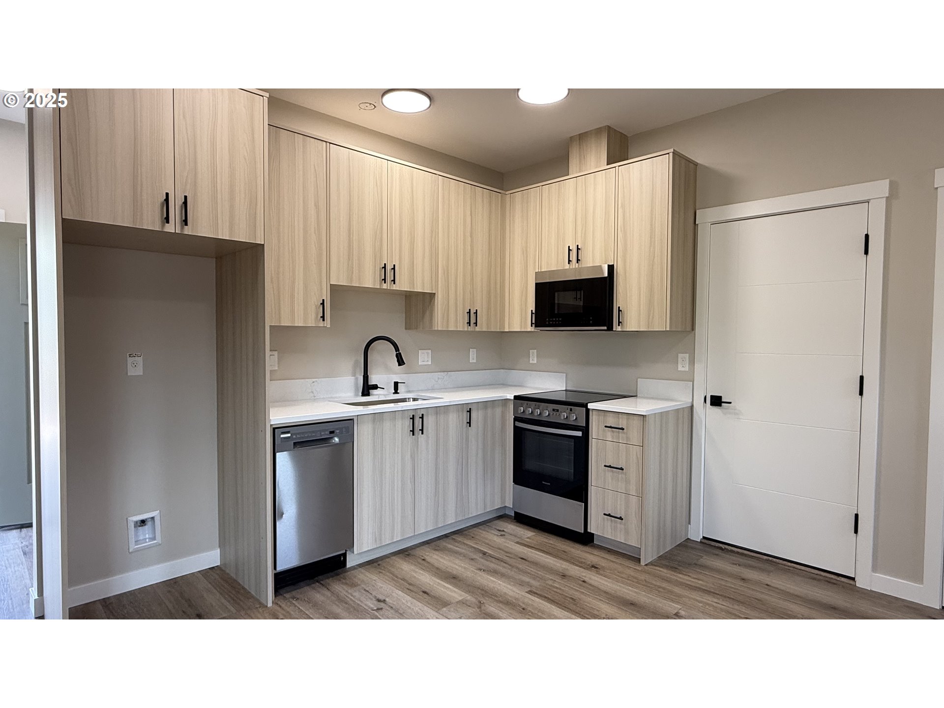 14362 Southeast Knight Street Portland, OR 97236 - Photo 7 of 15 a kitchen with stainless steel appliances granite countertop a refrigerator sink and stove