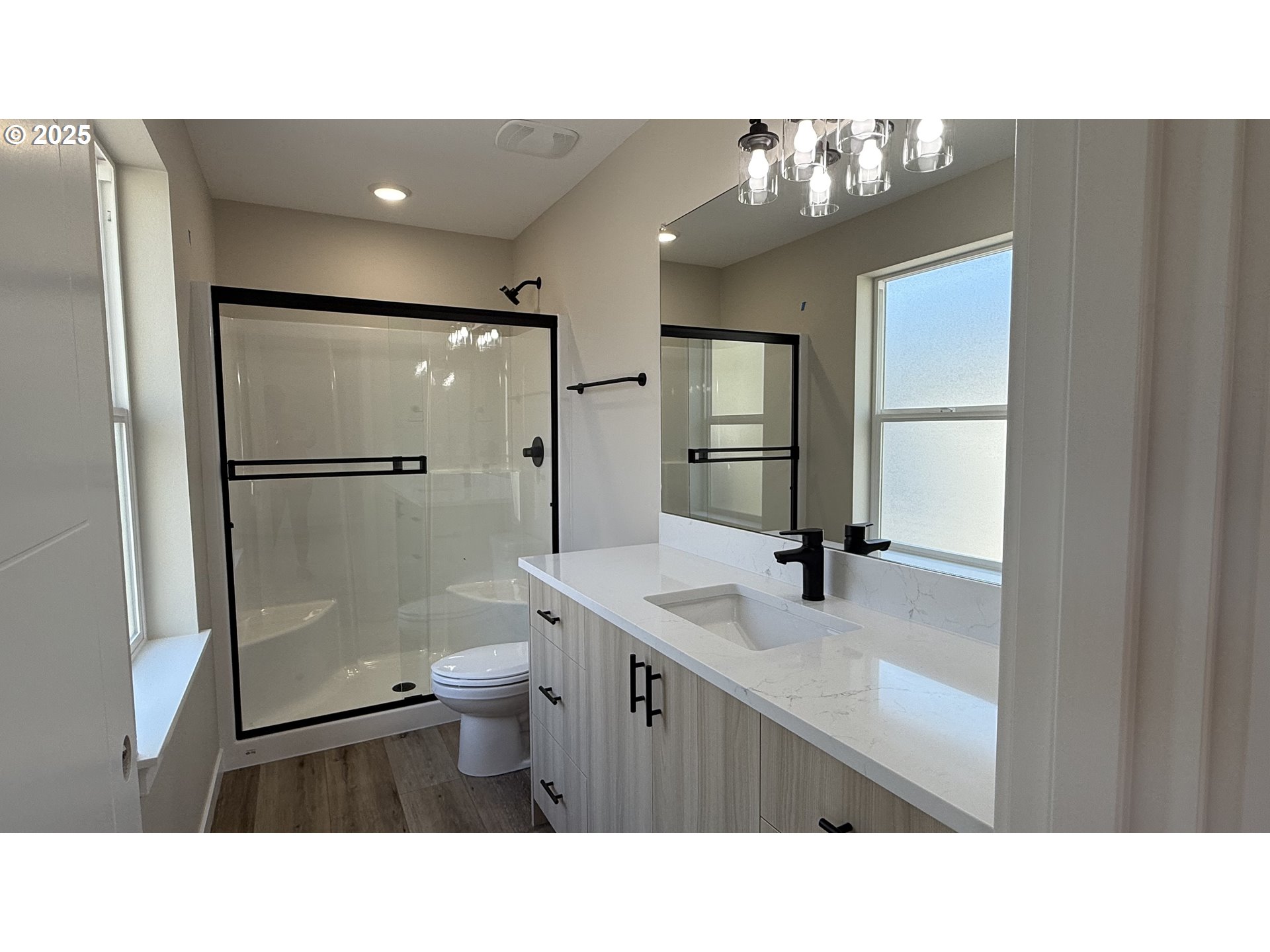 14362 Southeast Knight Street Portland, OR 97236 - Photo 10 of 15 a bathroom with a sink a toilet and shower