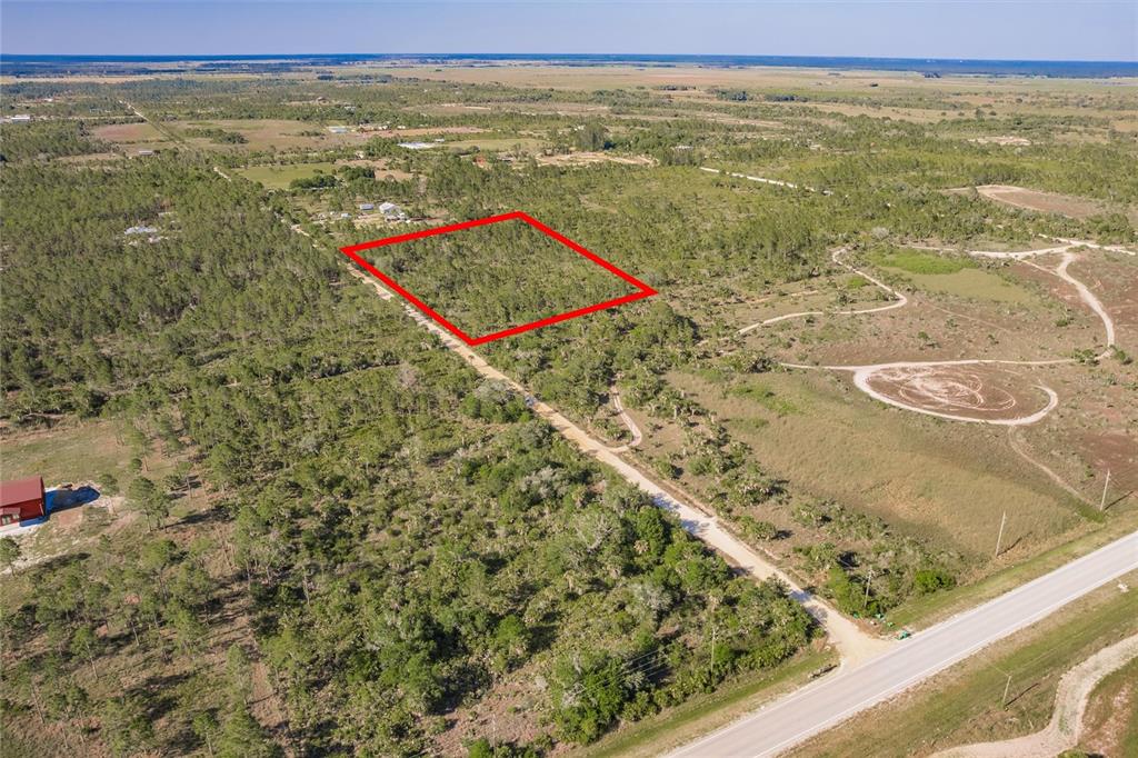 50448 Bermont Road Punta Gorda, FL 33982 - Photo 11 of 12 a view of ocean from a balcony