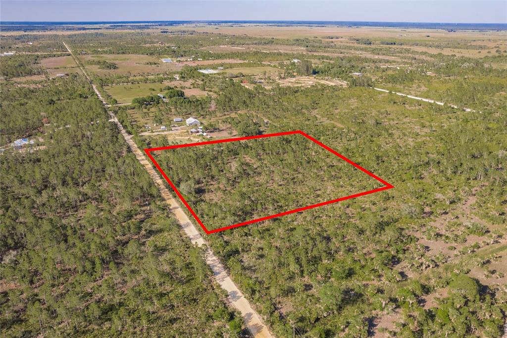 50448 Bermont Road Punta Gorda, FL 33982 - Photo 12 of 12 a view of a sky from a yard