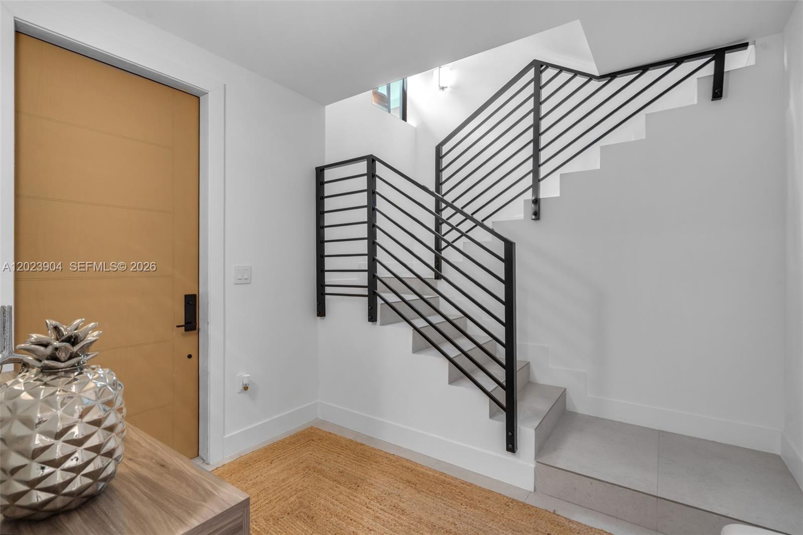 721 Southwest 11th Street, Unit G Miami, FL 33129 - Photo 4 of 40 a view of entryway with stairs