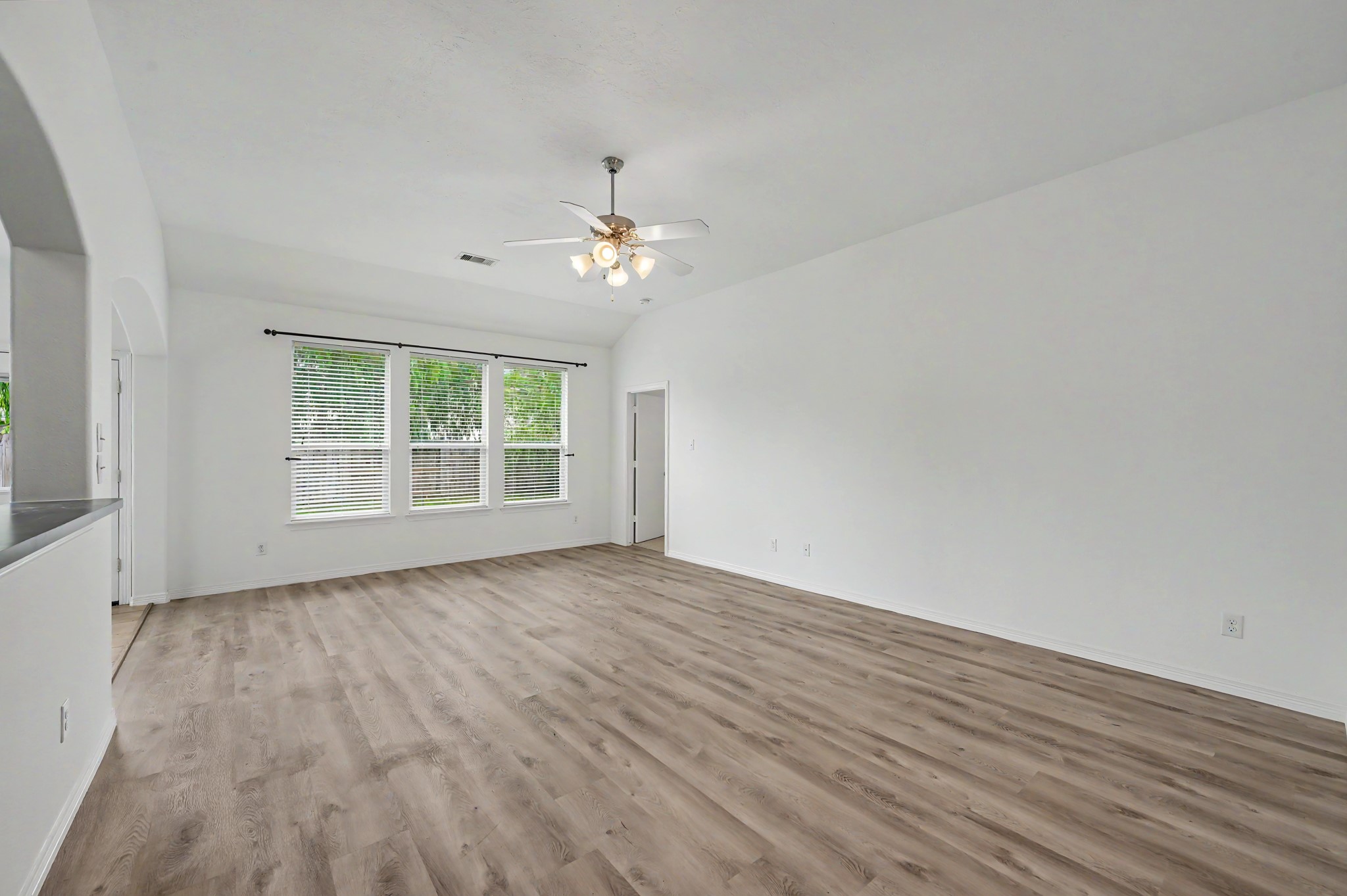 13035 Avery Ridge Lane Tomball, TX 77377 - Photo 6 of 27 Spacious & inviting living/family room overlooks the fenced backyard