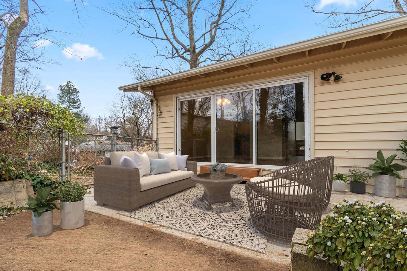 6505 Farley Street Springfield, VA 22152 - Photo 7 of 30 a balcony with furniture and a potted plant