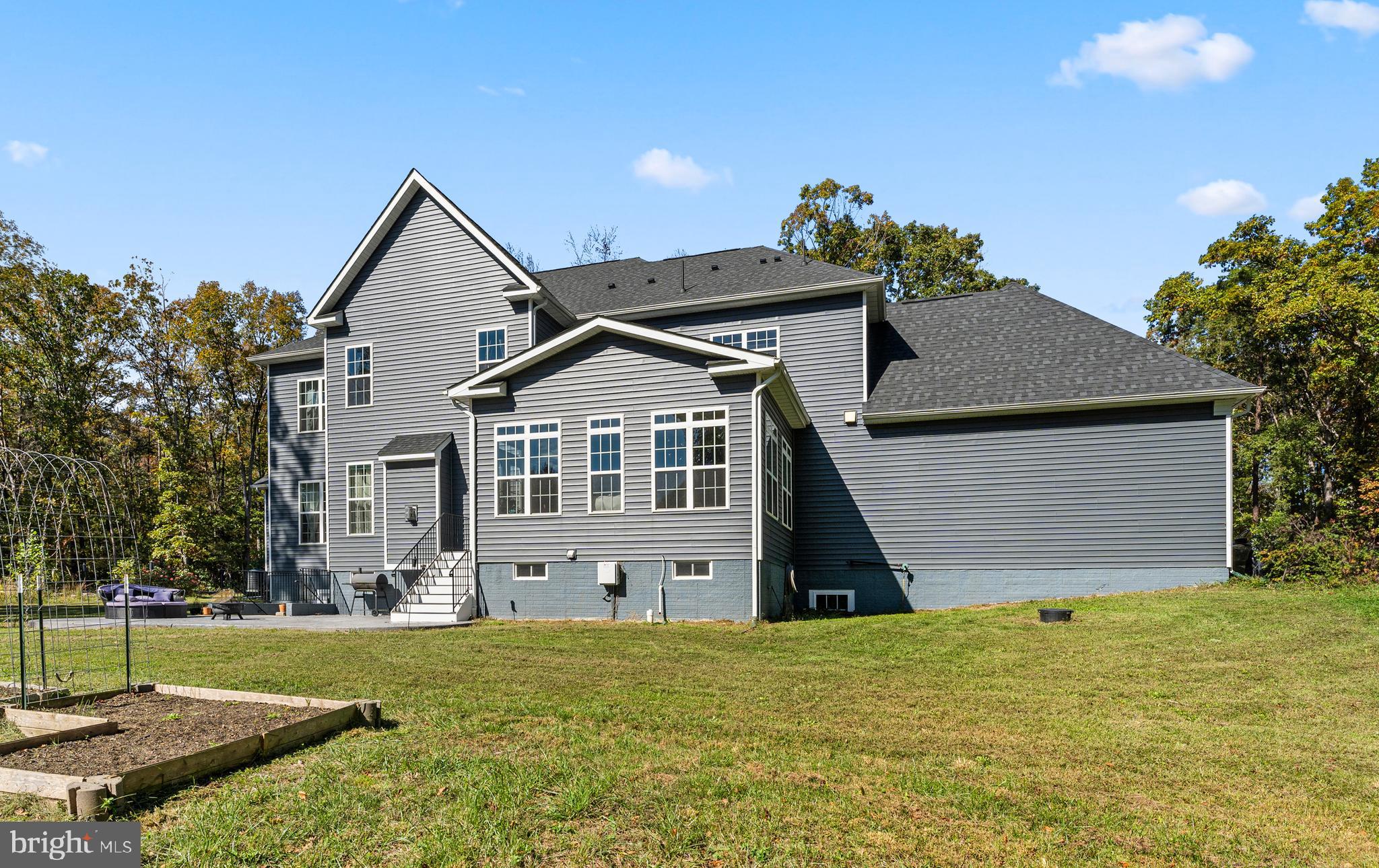 80 Shackelford Well Road Fredericksburg, VA 22406 - Photo 83 of 108 a front view of a house with a yard