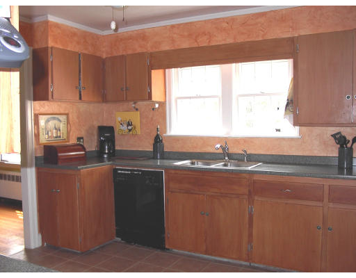 103 Field Road Longmeadow, MA 01106 - Photo 4 of 7 a kitchen with stainless steel appliances granite countertop a sink a stove a counter space and cabinets