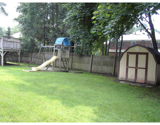 103 Field Road Longmeadow, MA 01106 - Photo 7 of 7 a view of a garden with a slide