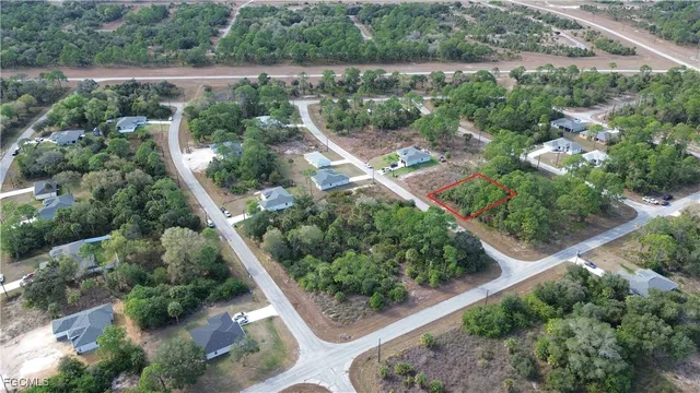 an aerial view of residential house with outdoor space and street view