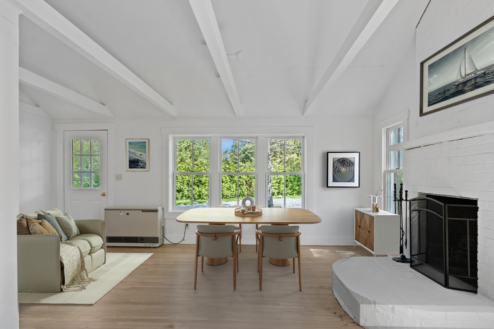 130 Wing Road Oak Bluffs, MA 02557 - Photo 1 of 21 Virtual Staging - Living room to left & dining area in center.