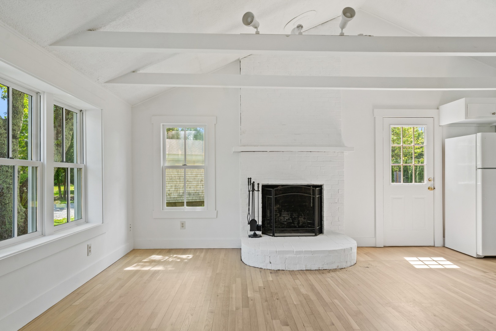 130 Wing Road Oak Bluffs, MA 02557 - Photo 6 of 21 Living/Dining room and working fireplace.