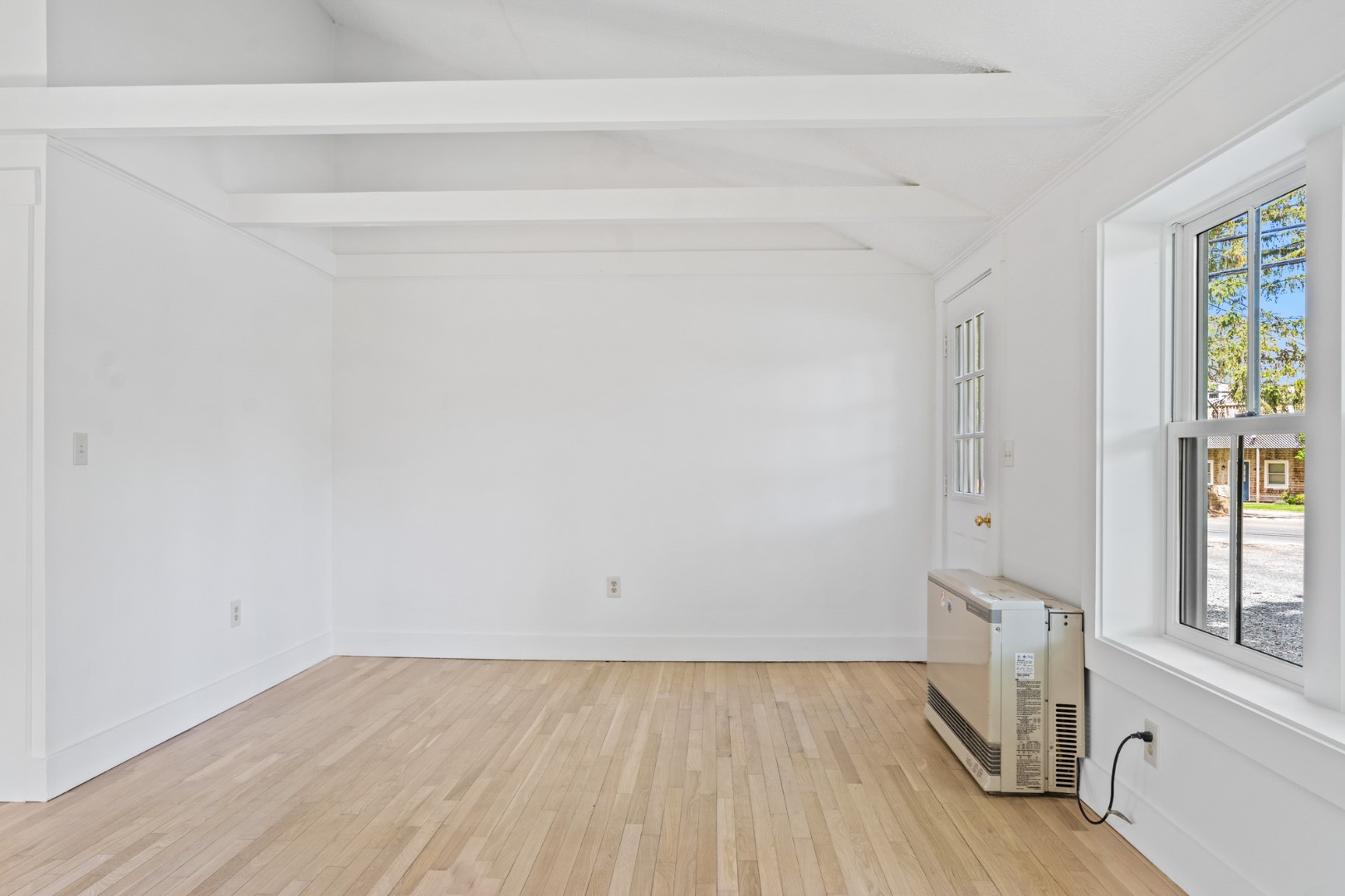 130 Wing Road Oak Bluffs, MA 02557 - Photo 10 of 21 Living area and front door.