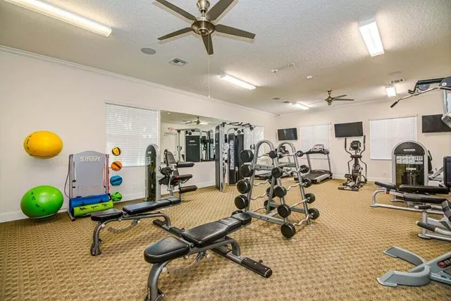 a living room with furniture and white walls