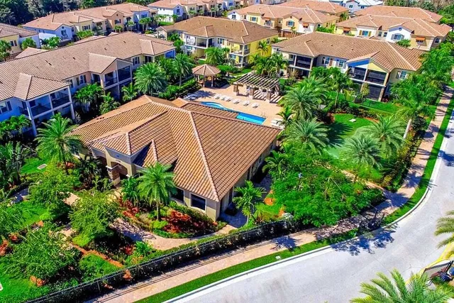 a kitchen with a sink appliances and cabinets