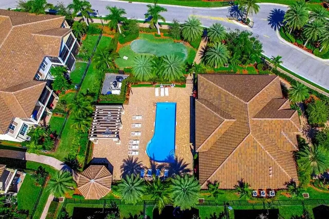 a kitchen with a sink and white cabinets