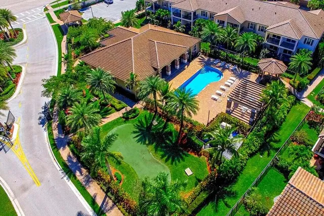 a bathroom with a sink toilet and mirror