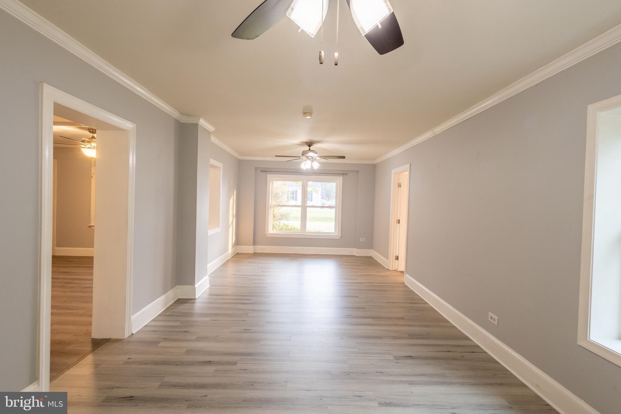 116 Richmond Road Colonial Beach, VA 22443 - Photo 8 of 31 Spacious Family Room w/Ceiling Fans