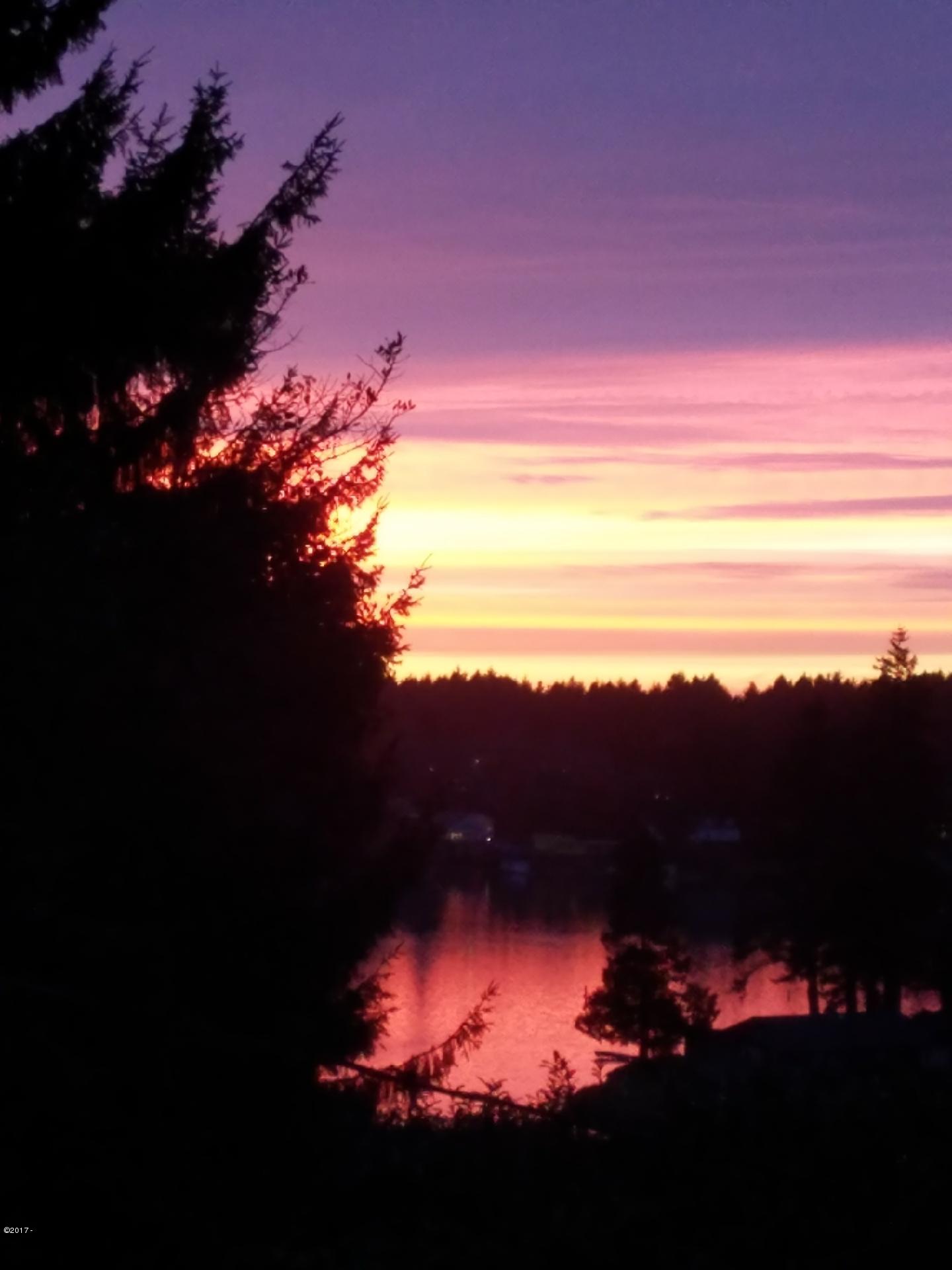 2970 Northeast East Devils Lake Road Otis, OR 97368 - Photo 3 of 12 Evening sunset on the lake