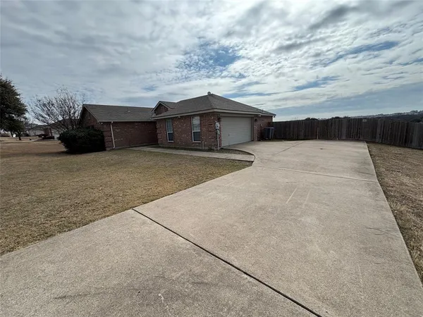 a view of house with outdoor space