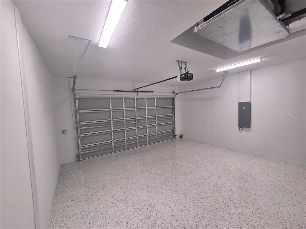 2967 Barry Road North Port, FL 34286 - Photo 16 of 16 a view of an empty room with a garage