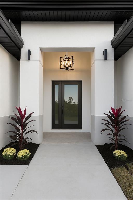 2967 Barry Road North Port, FL 34286 - Photo 2 of 16 a view of entryway with a potted plant