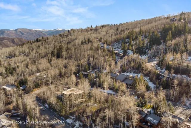 a view of a lake with a mountain in the background