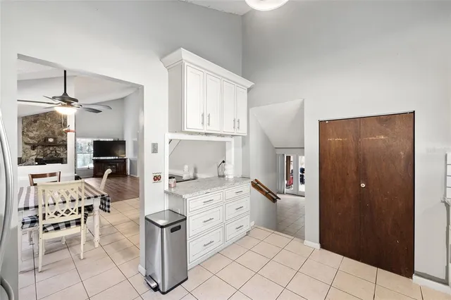 a kitchen with a cabinets and appliances